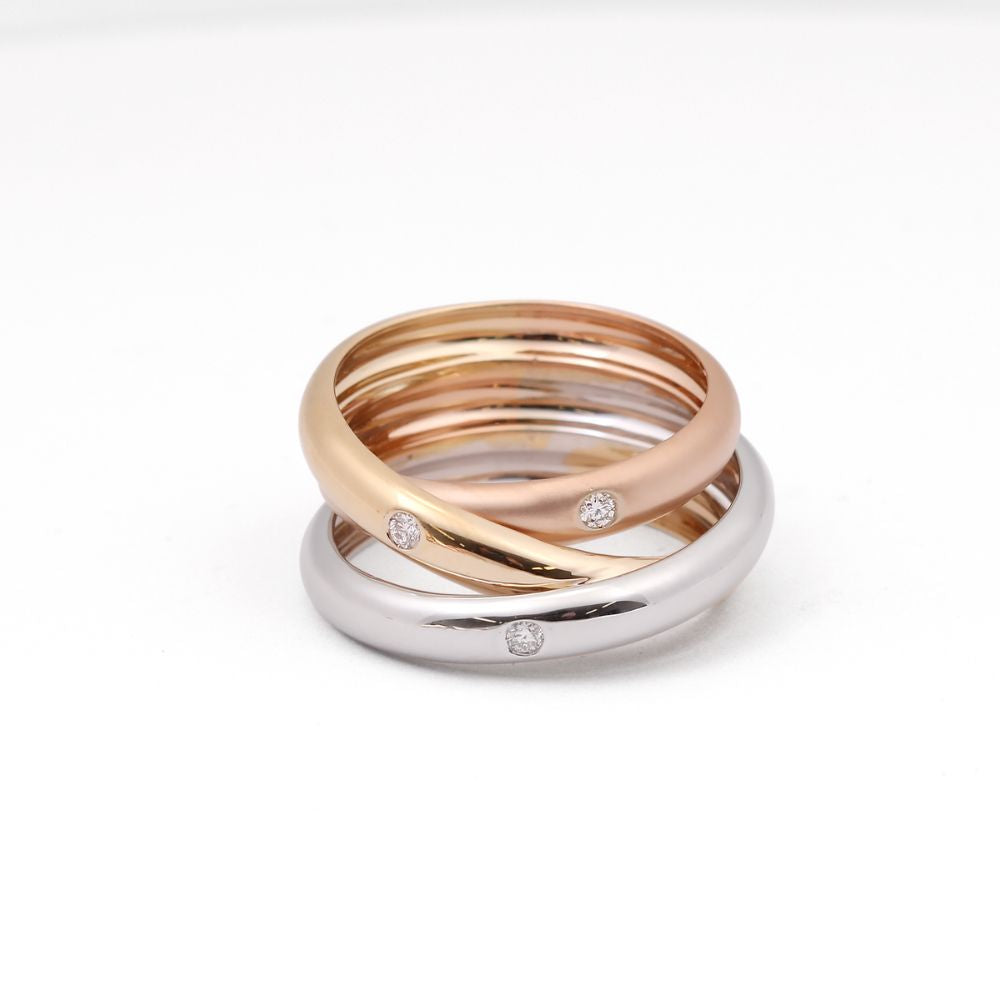 Anillo triple entrelazado con diamantes