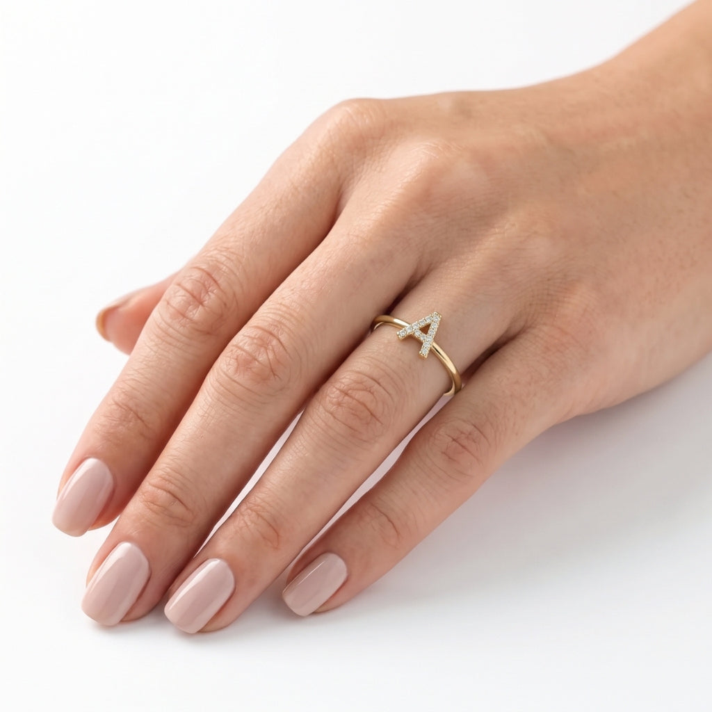 Anillo letra inicial oro 10k con diamante