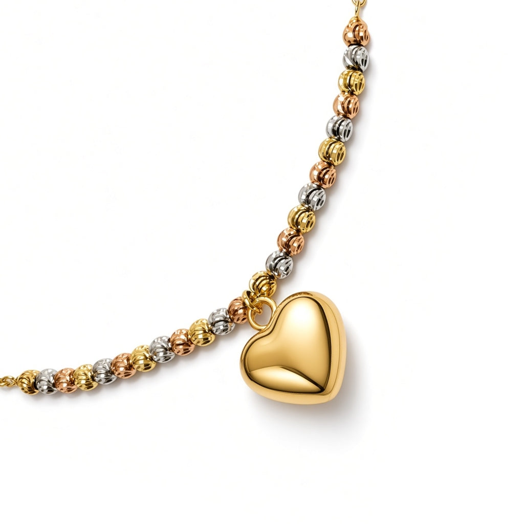 Pulsera con esferas diamantadas y dije de corazón