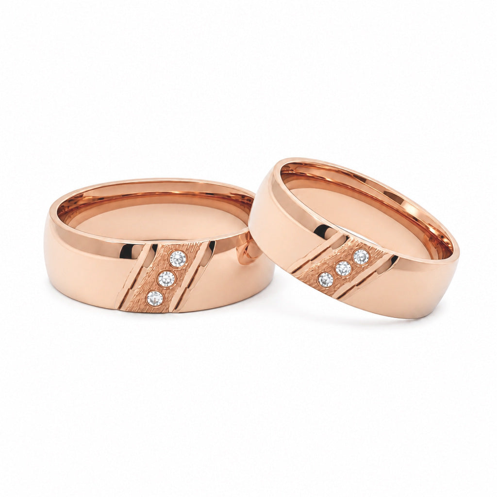 Par de argollas de matrimonio oro rosa con trío de circonias 6 mm