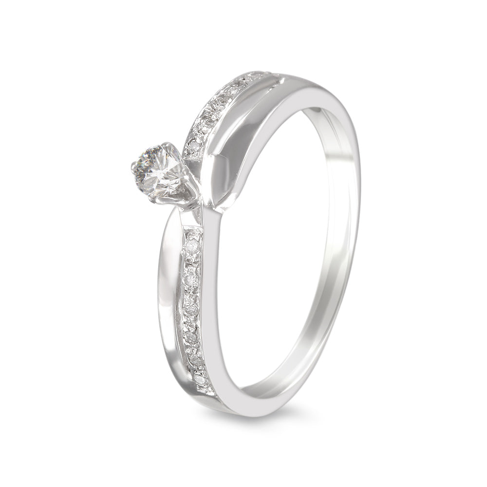Anillo de compromiso con diamante central 0.12 ct y diamantes laterales