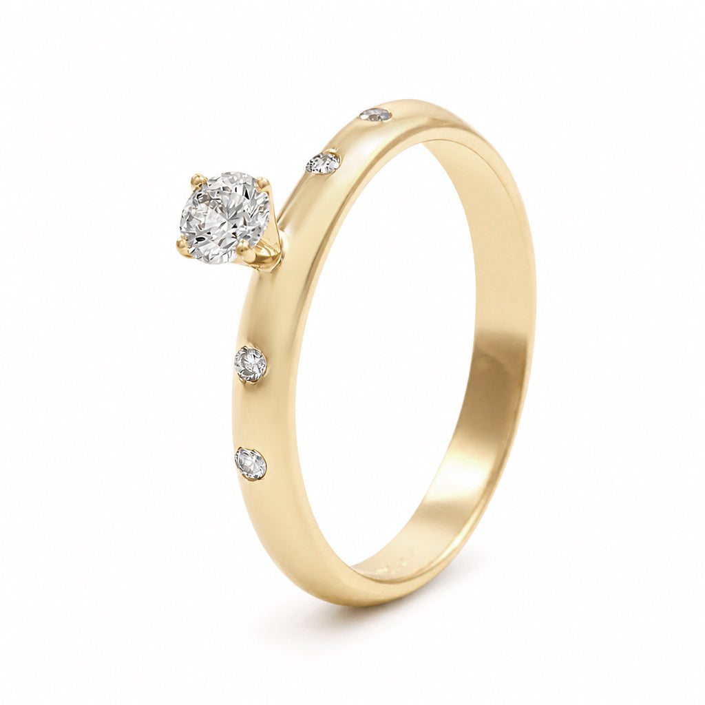 Anillo de compromiso con diamante central 0.19 ct y diamantes laterales