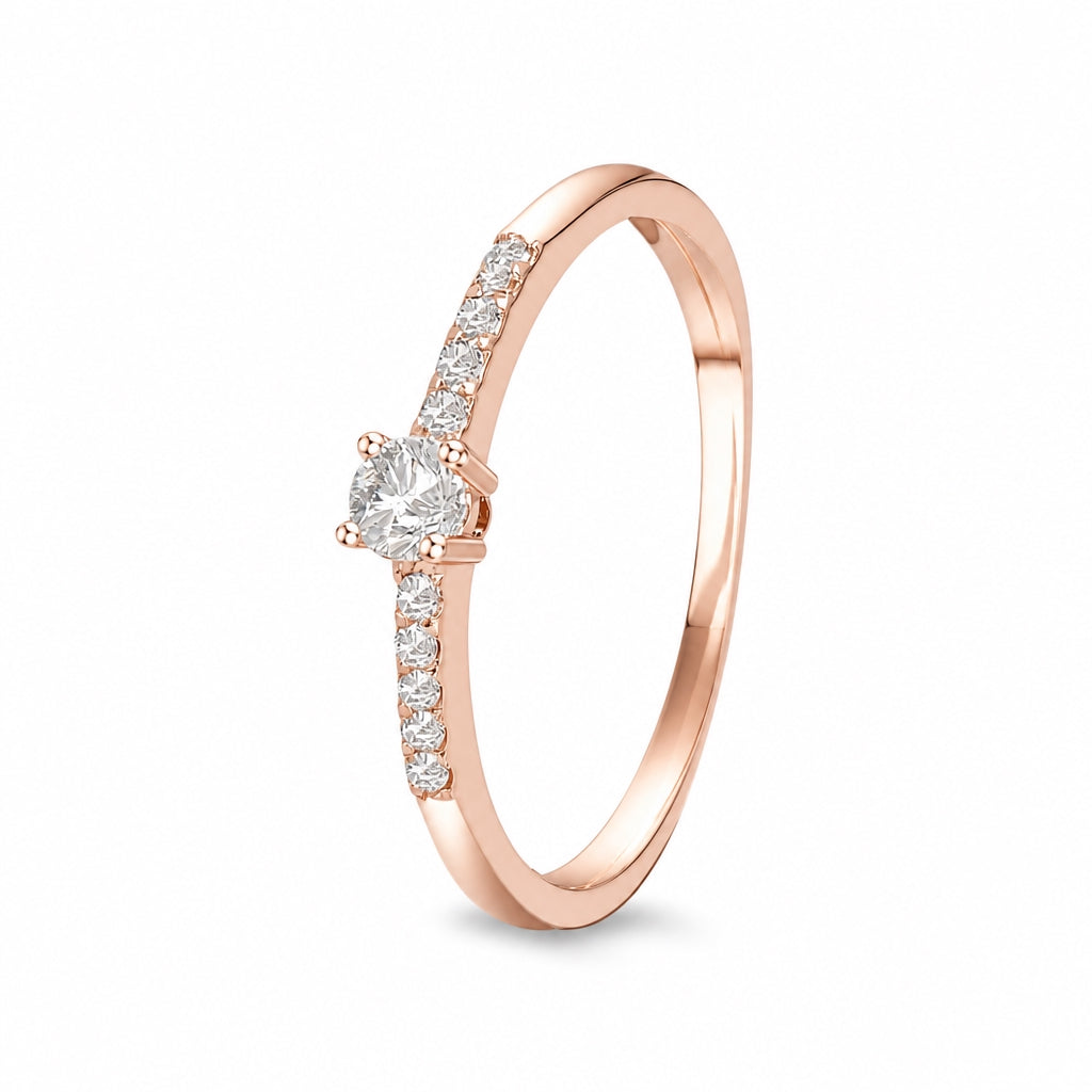 Anillo de compromiso con diamante central 0.08 ct y diamantes laterales