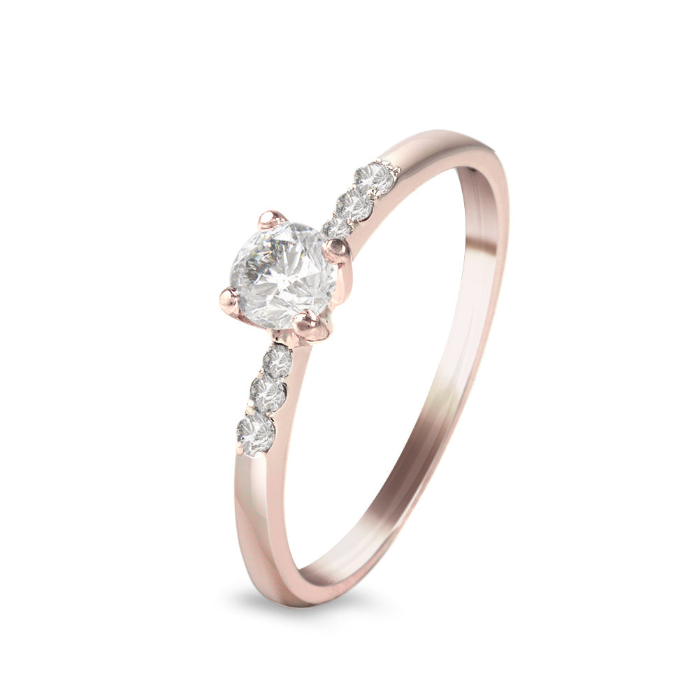 Anillo de compromiso con diamante central 0.35 ct y diamantes laterales