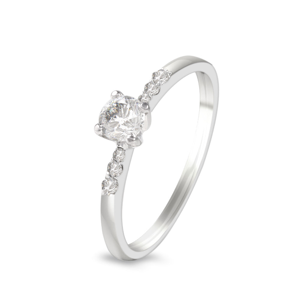 Anillo de compromiso con diamante central 0.30 ct y diamantes laterales
