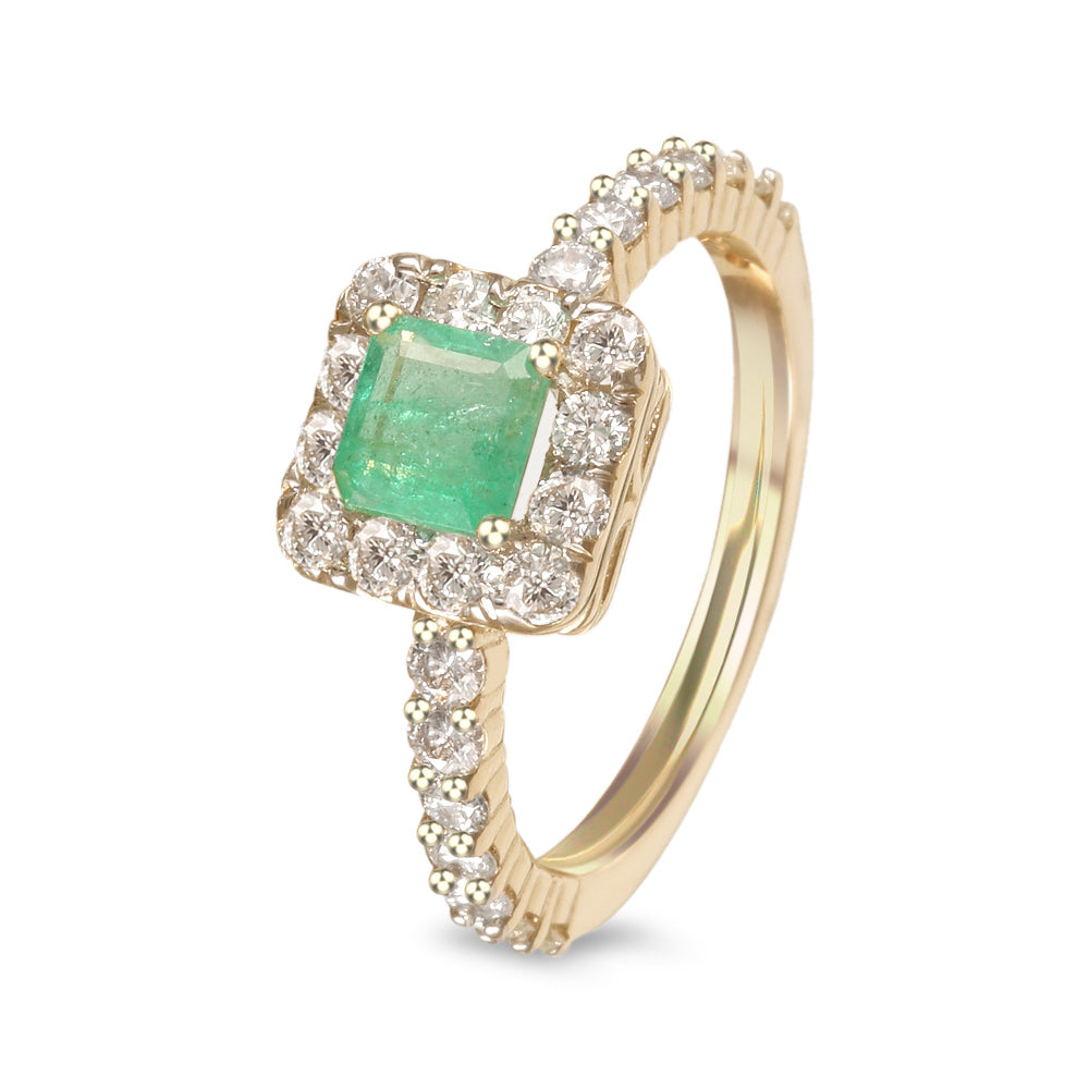 Anillo con esmeralda y diamantes laterales
