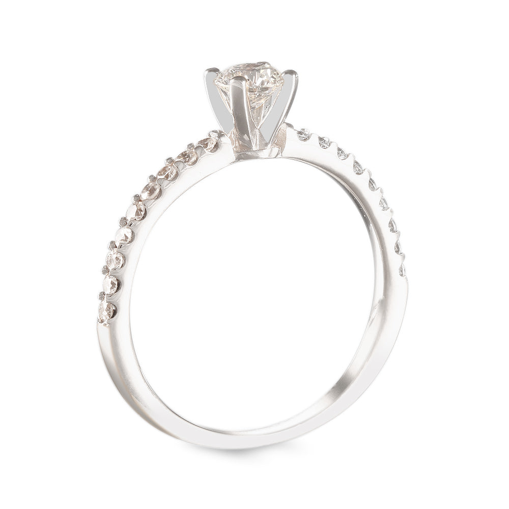 Anillo de compromiso con diamante central 0.30 ct y diamantes laterales