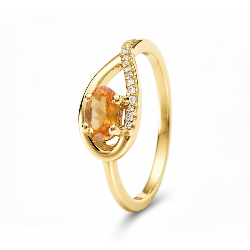 Anillo de oro amarillo con espesartina y diamantes