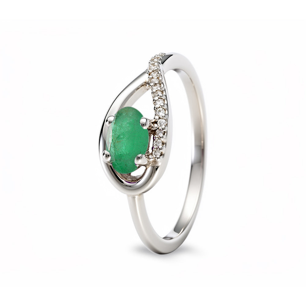 Anillo de oro blanco con esmeralda y diamantes