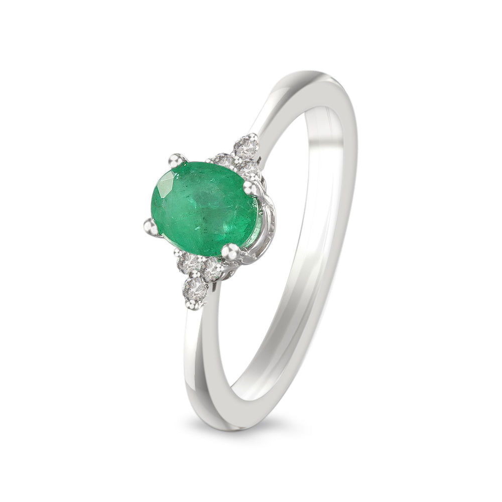 Anillo con esmeralda y diamantes laterales