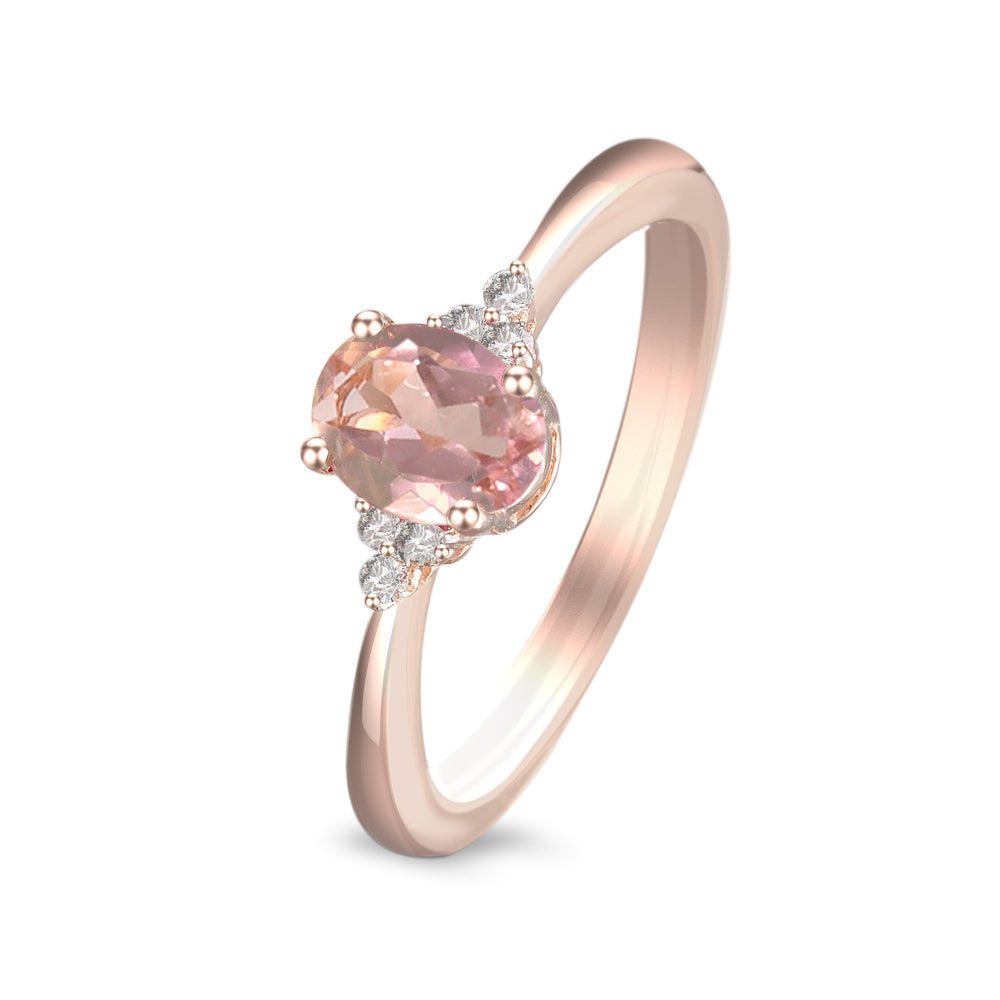 Anillo con turmalina rosa y diamantes laterales