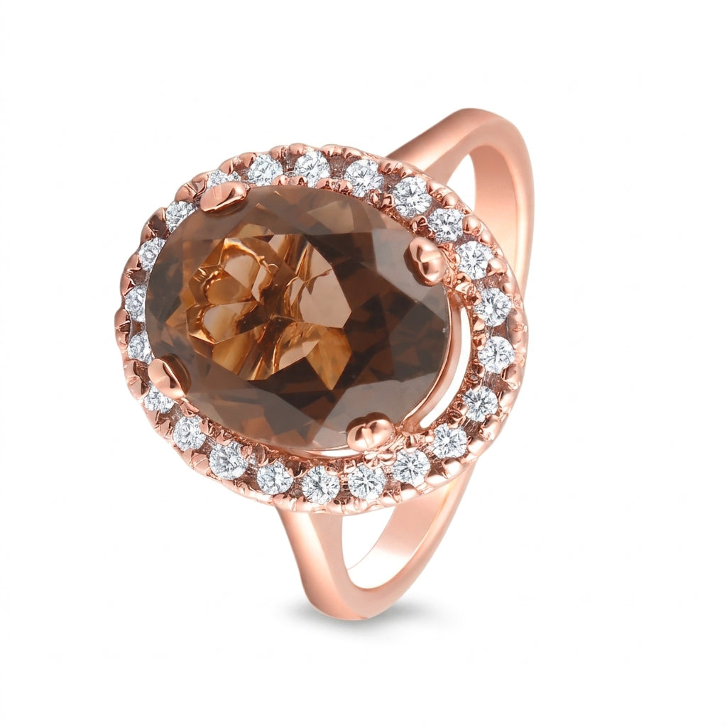 Anillo de oro rosa con topacio y diamantes