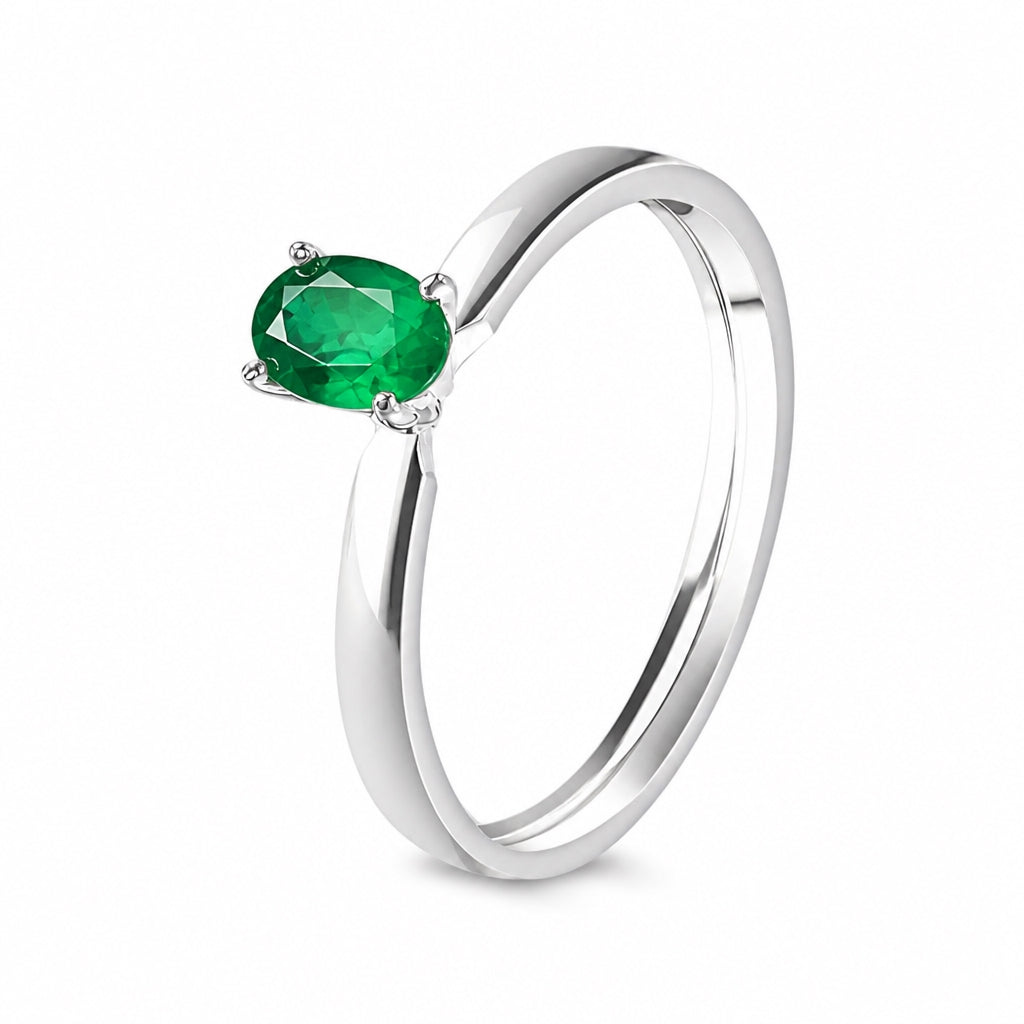 Anillo de oro blanco con esmeralda recristalizada