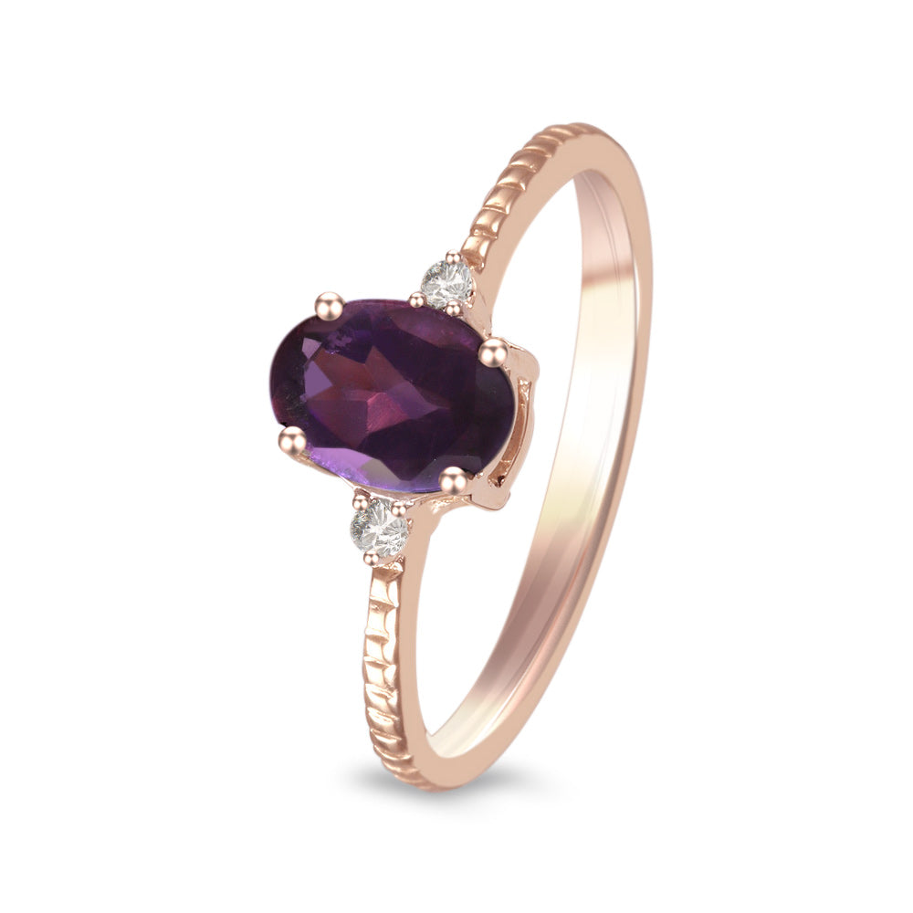 Anillo con amatista y diamantes laterales (Febrero)