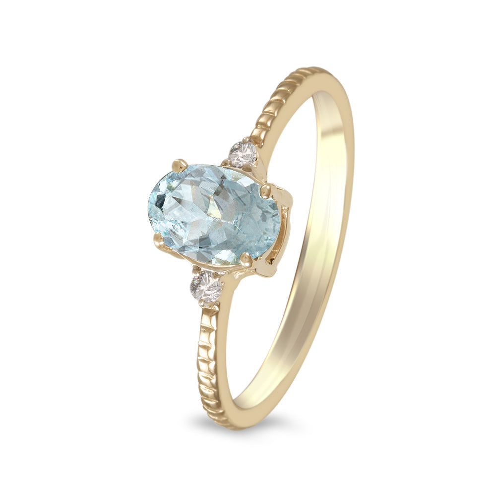 Anillo con aguamarina y diamantes laterales (Marzo)