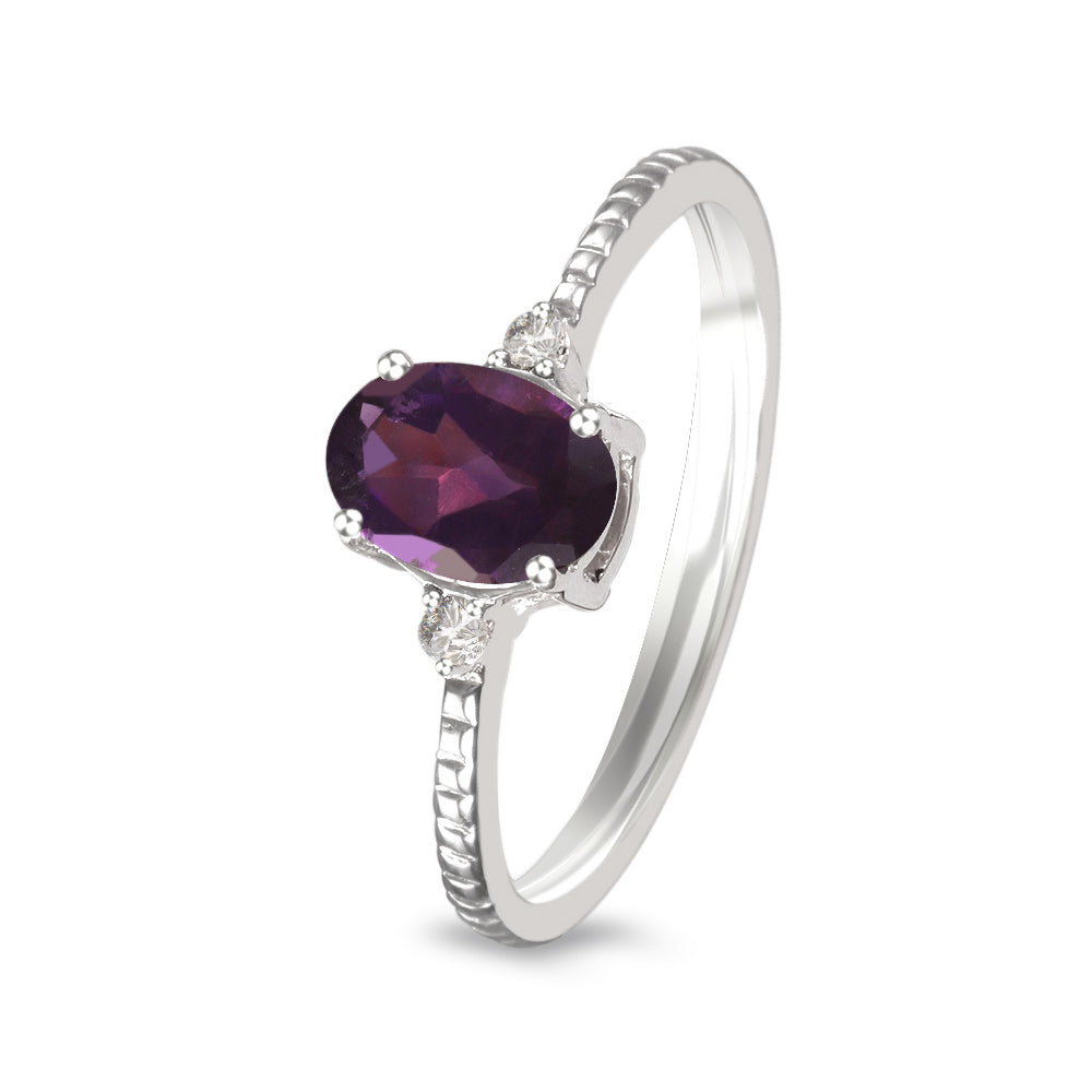 Anillo con amatista y diamantes laterales (Febrero)