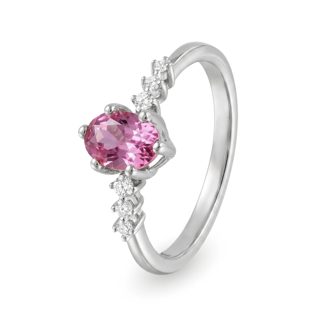 Anillo de oro blanco con topacio y diamantes laterales