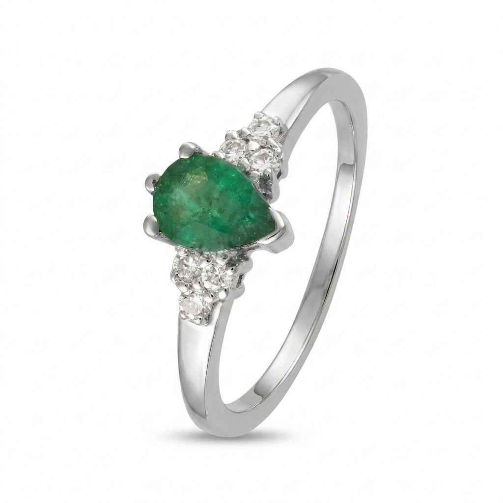 Anillo de oro blanco con esmeralda y diamantes