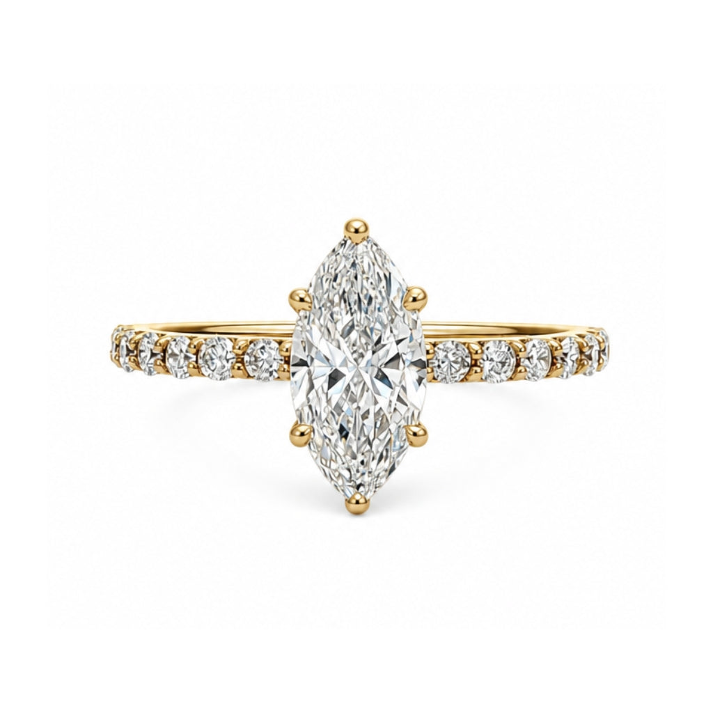 Anillo de compromiso con diamante corte marquise y diamantes laterales