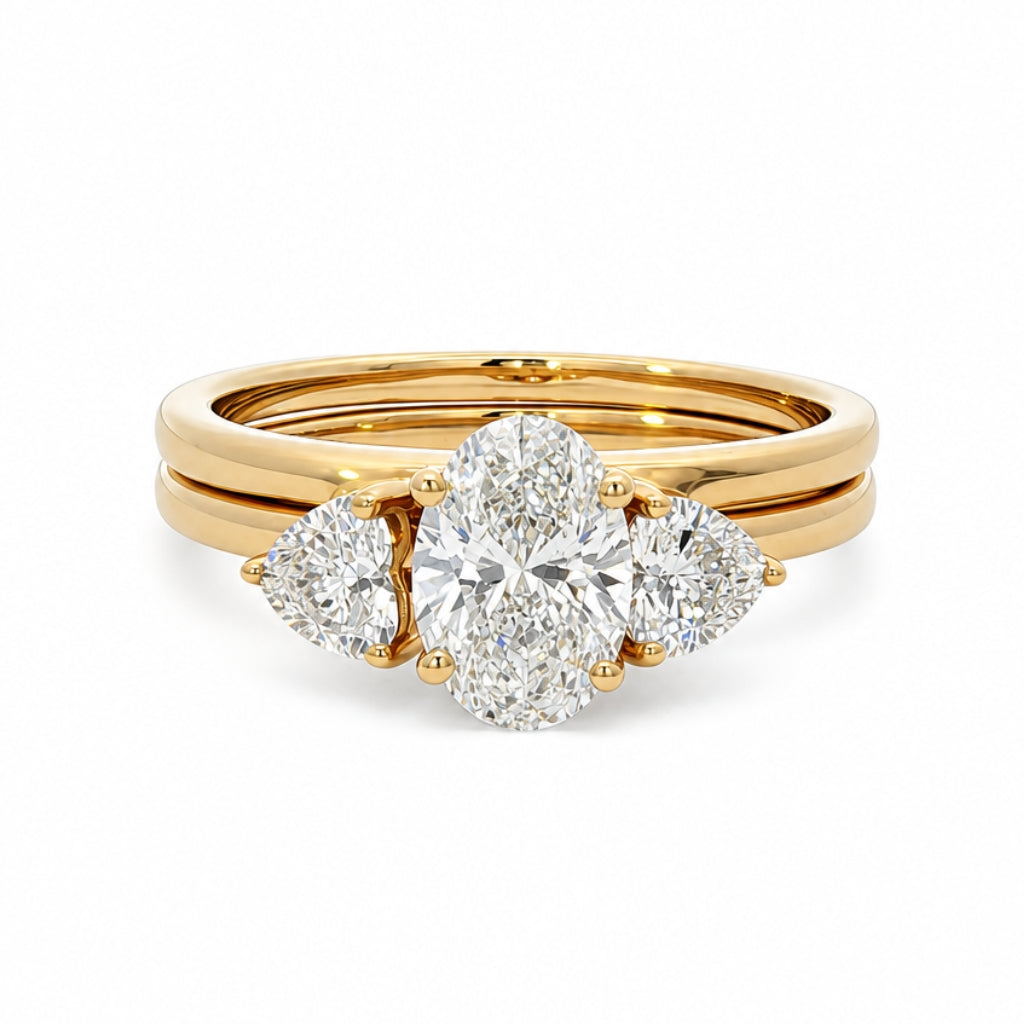 Anillo dúo de compromiso con diamante central lab-grown oval y ensamble de diamantes corazón