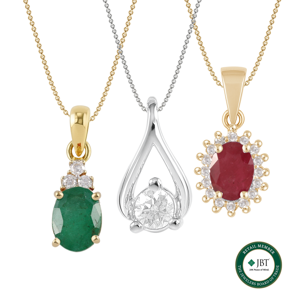 dije oro amarillo con esmeralda y diamantes, dije oro blanco con diamante, dije oro amarillo con rubí y diamantes