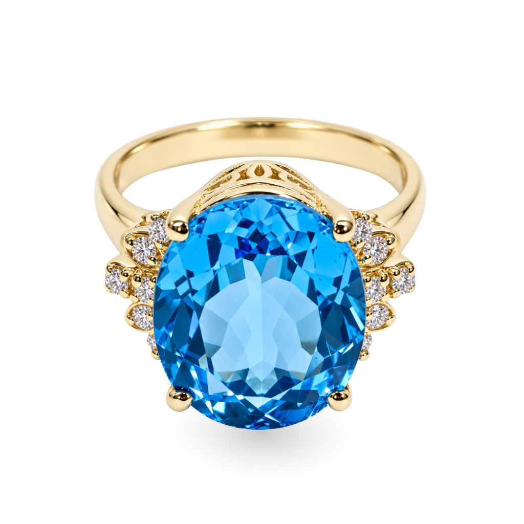 Anillo con topacio azul y diamantes laterales