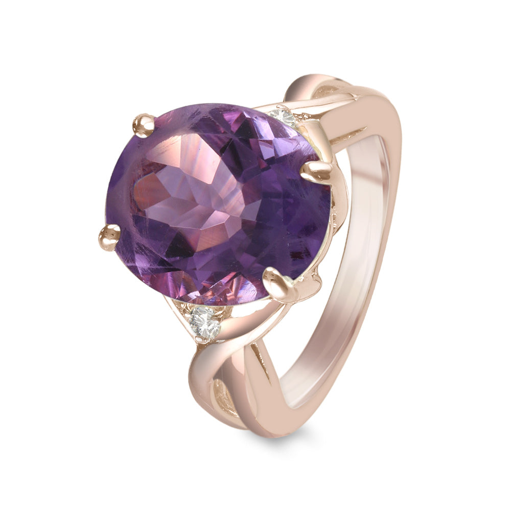 Anillo con amatista y diamantes laterales