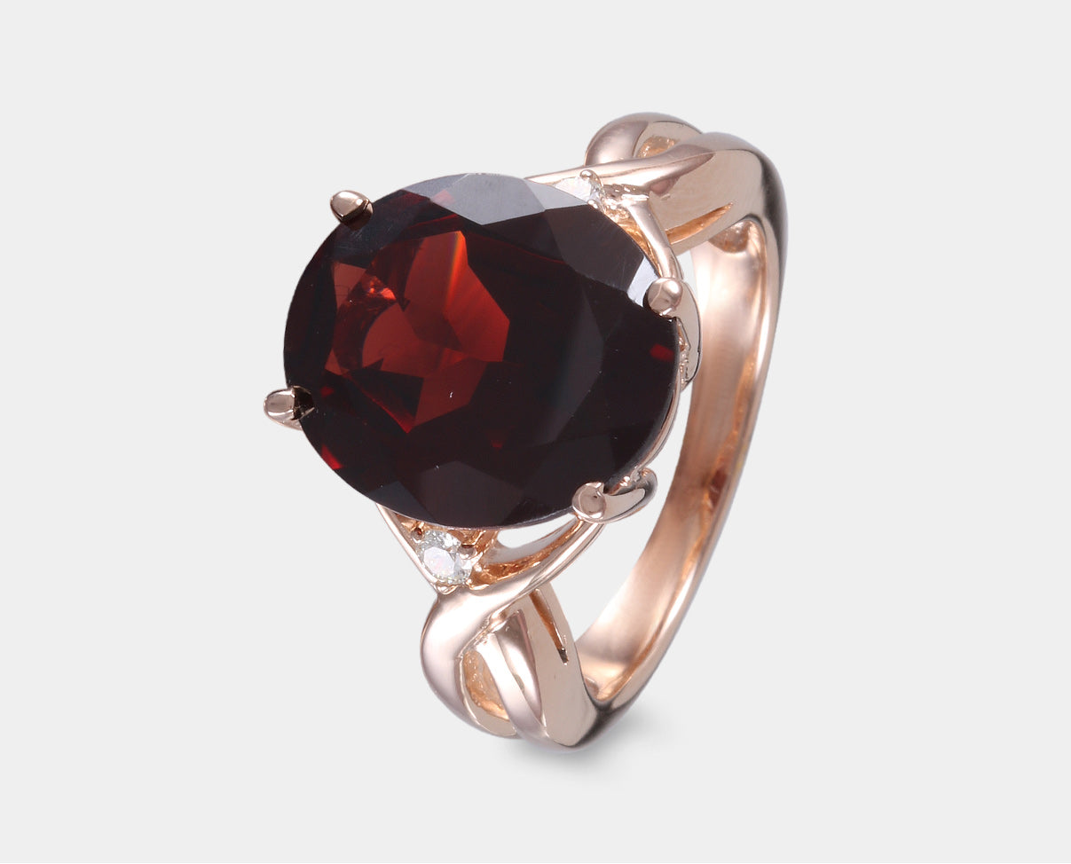anillo piedra granate con diamante oro 14k