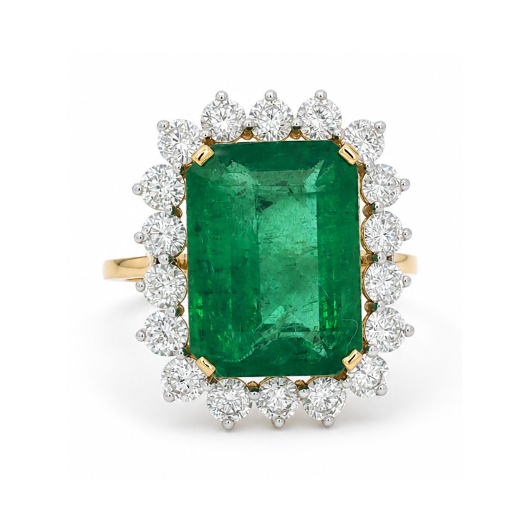 Anillo con esmeralda y halo de diamantes
