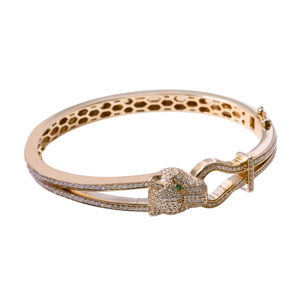 Brazalete rígido de pantera con diamantes y esmeraldas
