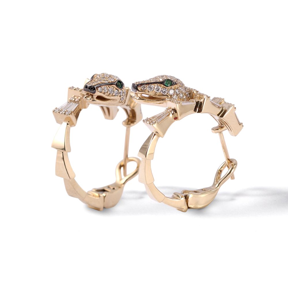 Arracadas diseño de serpiente con diamantes y esmeraldas