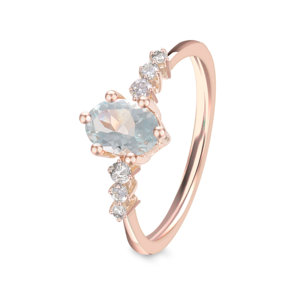 Anillo con aguamarina y diamantes laterales