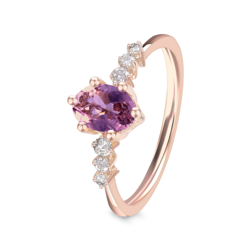 Anillo con amatista y diamantes laterales