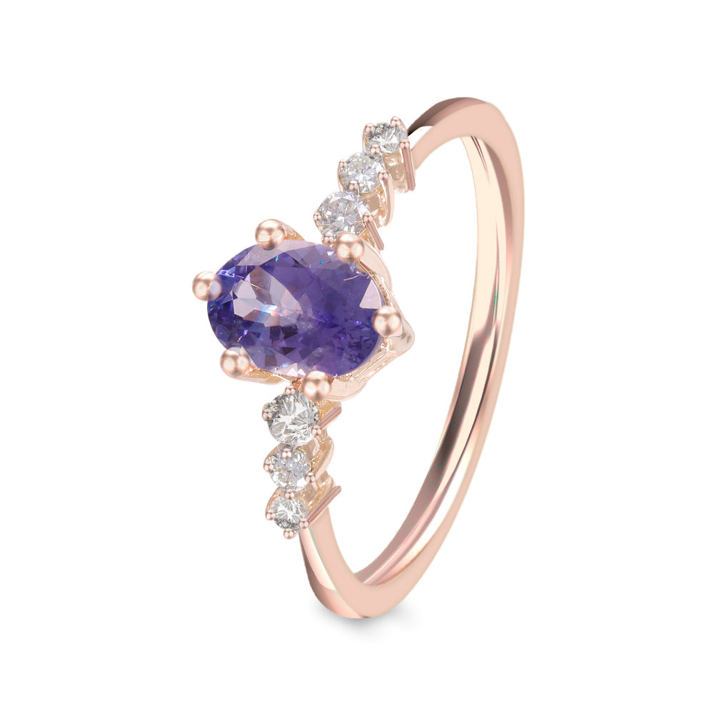 Anillo con tanzanita y diamantes laterales