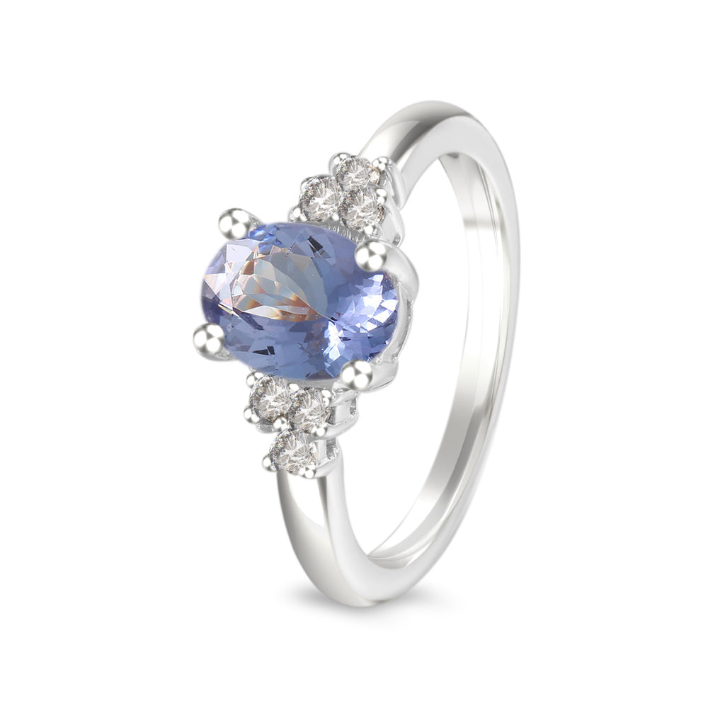 Anillo con tanzanita y diamantes laterales
