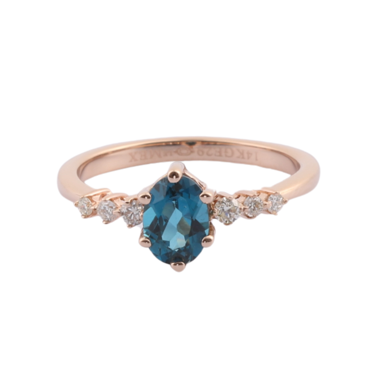 Anillo con topacio london y diamantes laterales