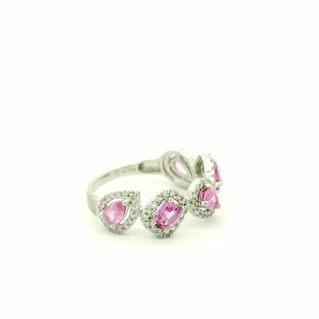 Anillo churumbela con zafiros rosas y halo de diamantes en oro blanco