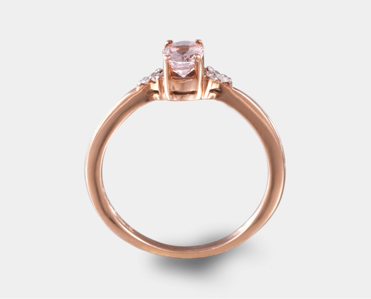 Anillo oro rosa con morganita y diamantes laterales