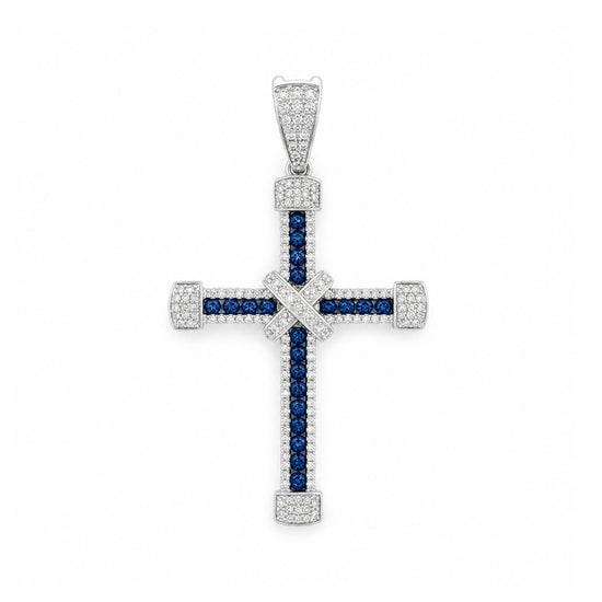 Dije con diseño de cruz con zafiro y diamantes