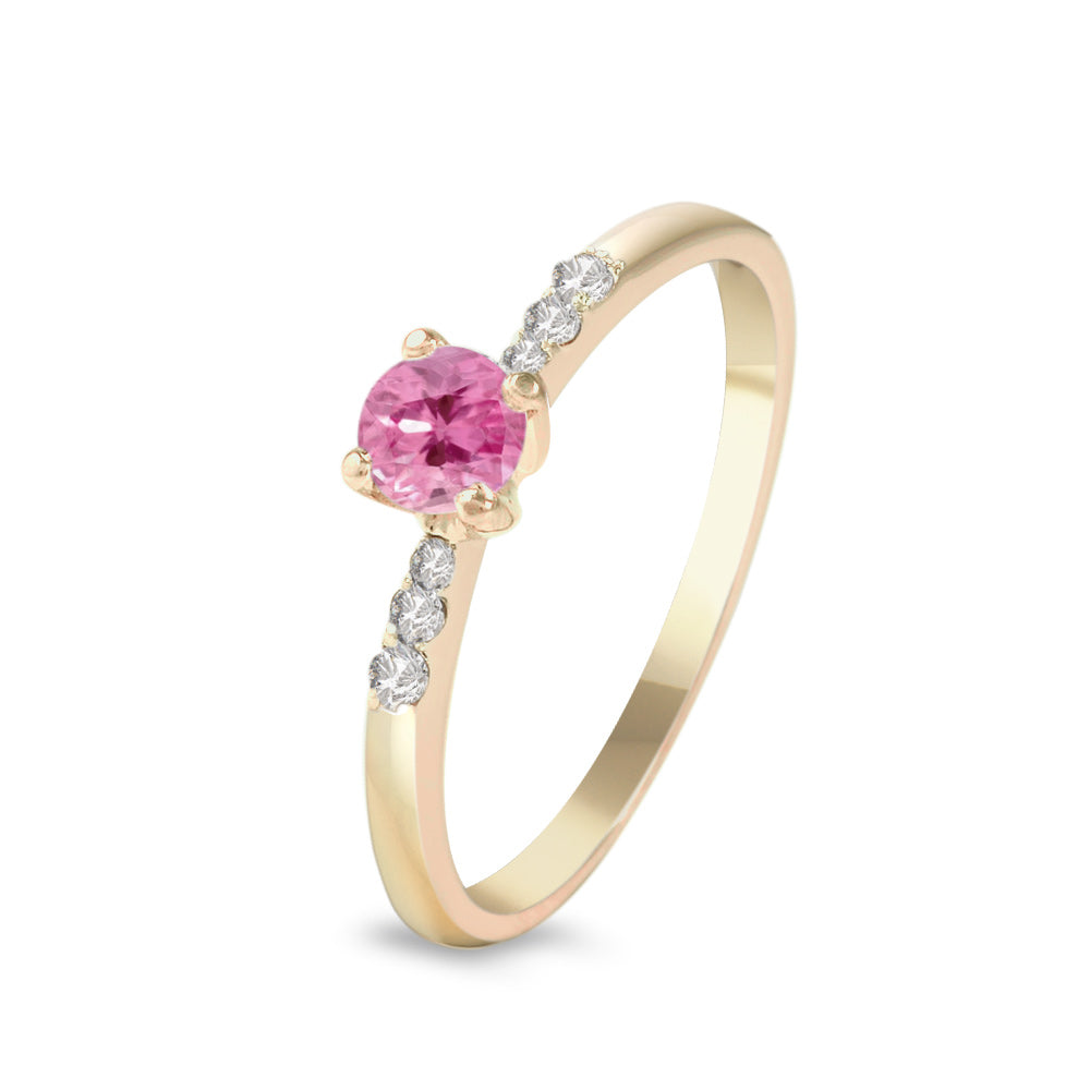 Anillo con zafiro rosa y diamantes laterales