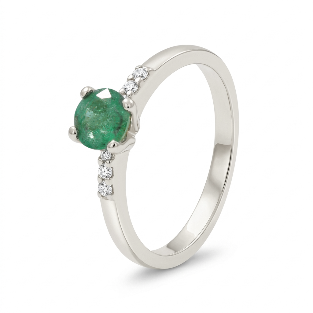 Anillo con esmeralda y diamantes laterales