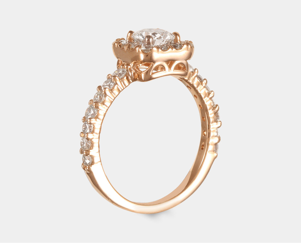 Anillo de Compromiso con diamante  y halo de diamantes en oro rosa de 14 k. Certificado GIA