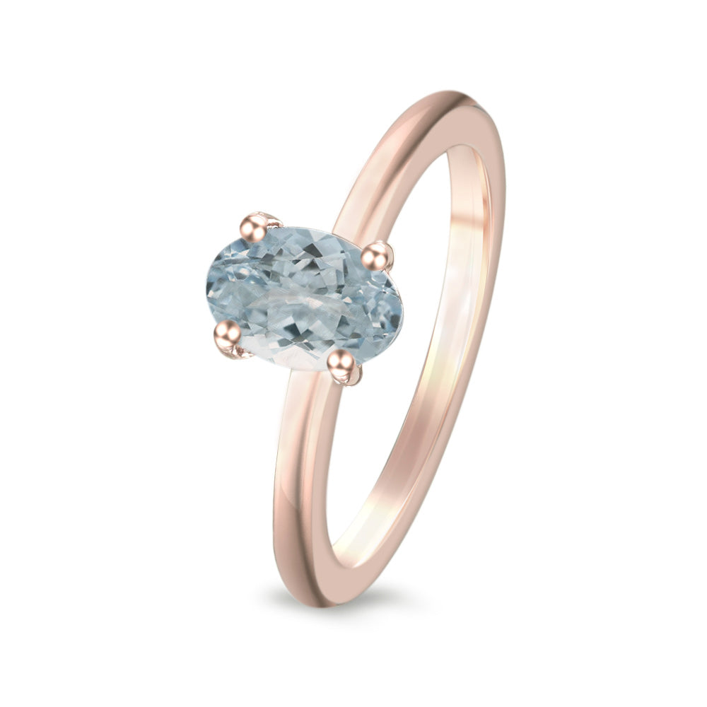 Anillo de oro rosa con aguamarina