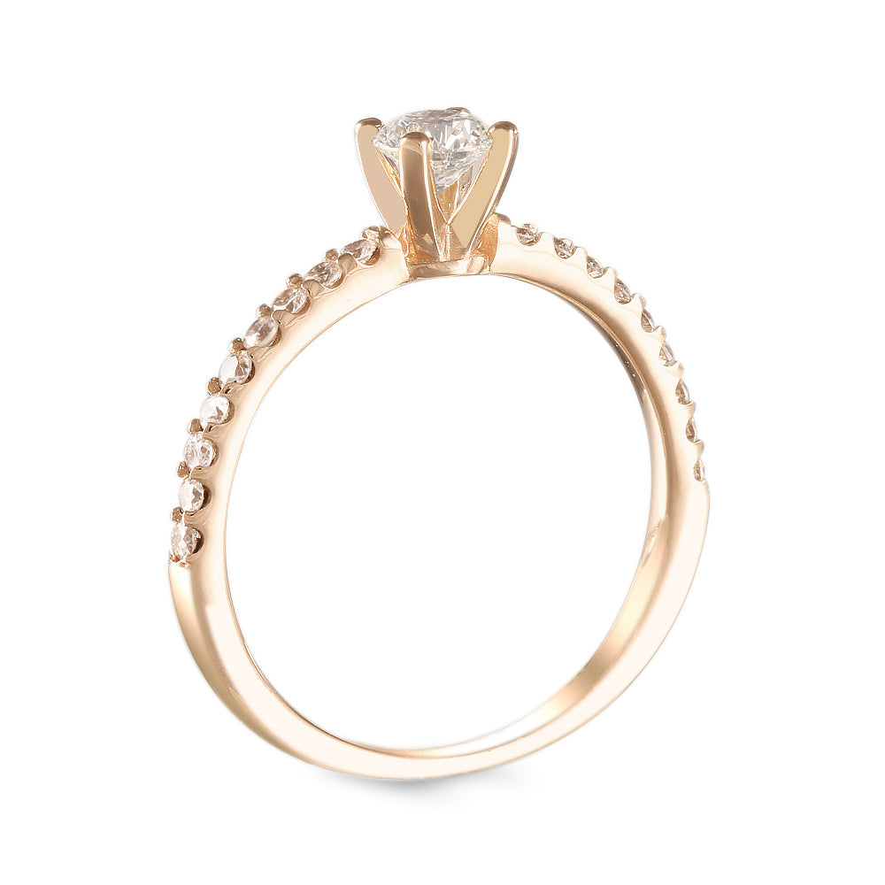 Anillo de compromiso con diamante central 0.30 ct y diamantes laterales