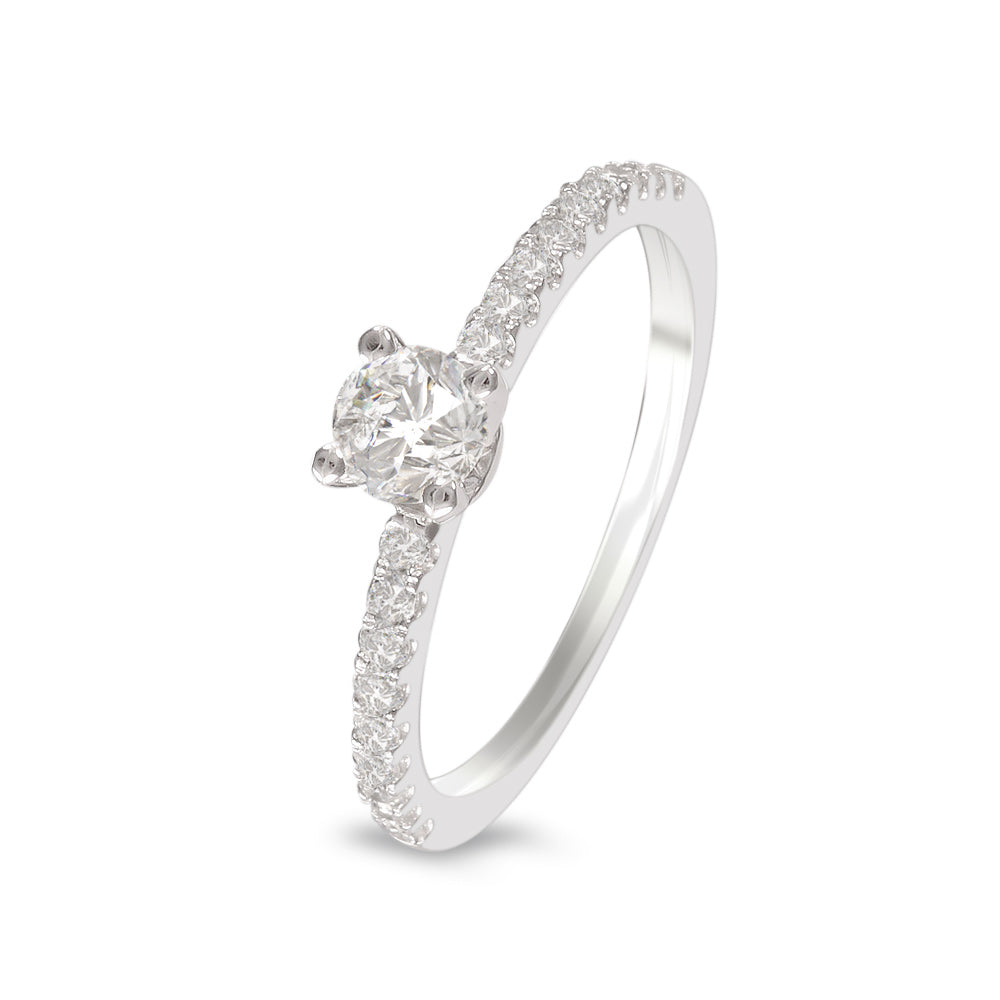 Anillo de compromiso con diamante central 0.30 ct y diamantes laterales