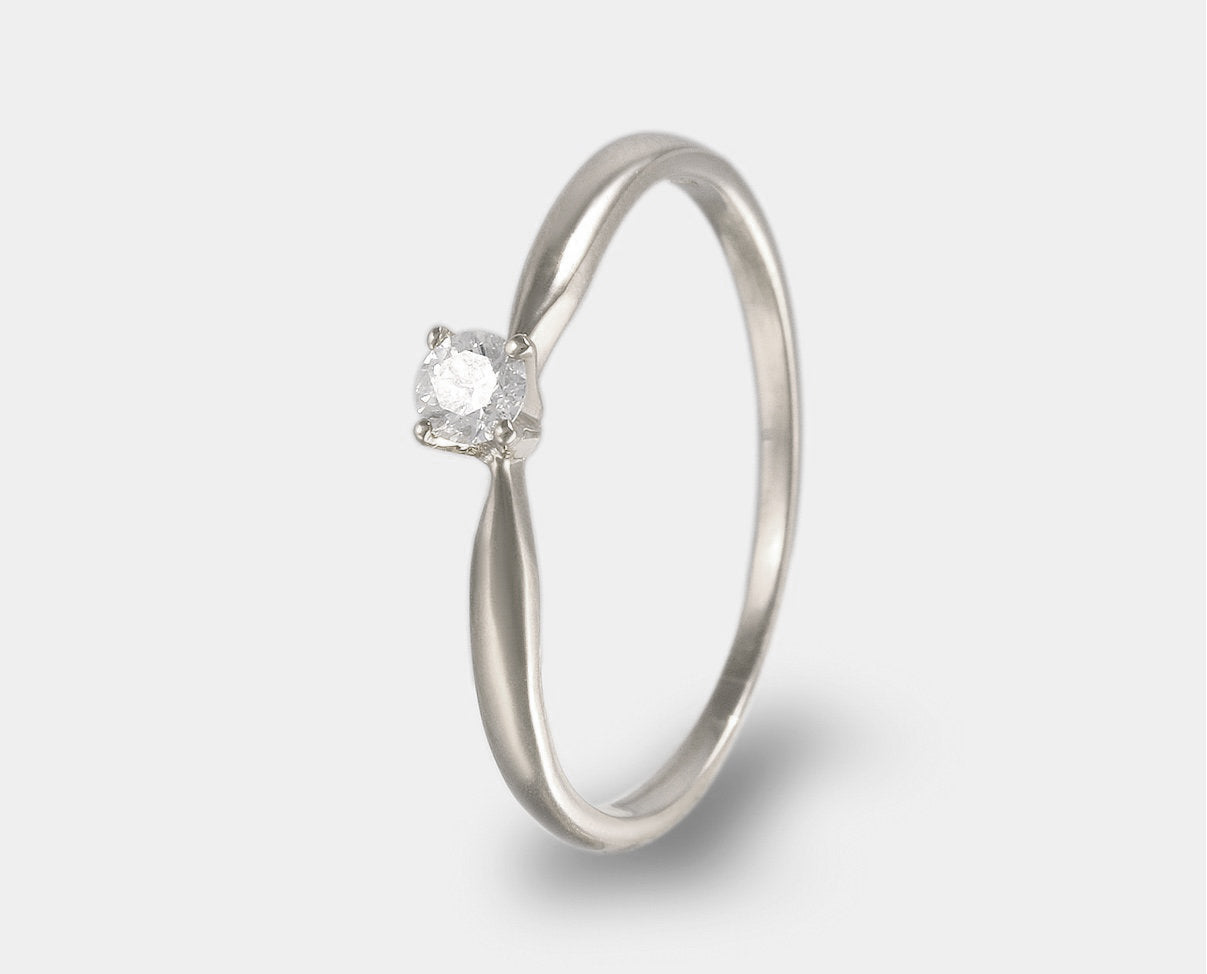 Anillo de compromiso solitario con diamante 0.11 ct