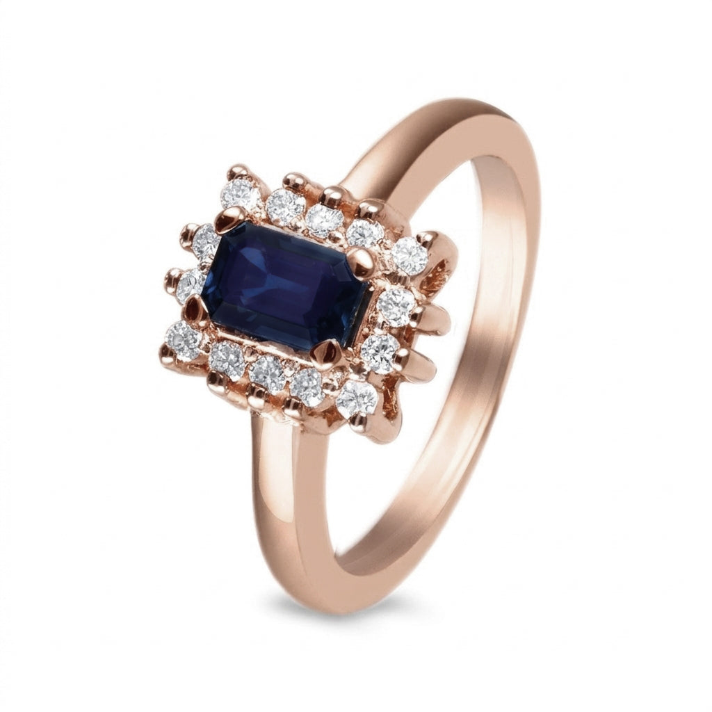 Anillo de oro rosa con zafiro y diamantes