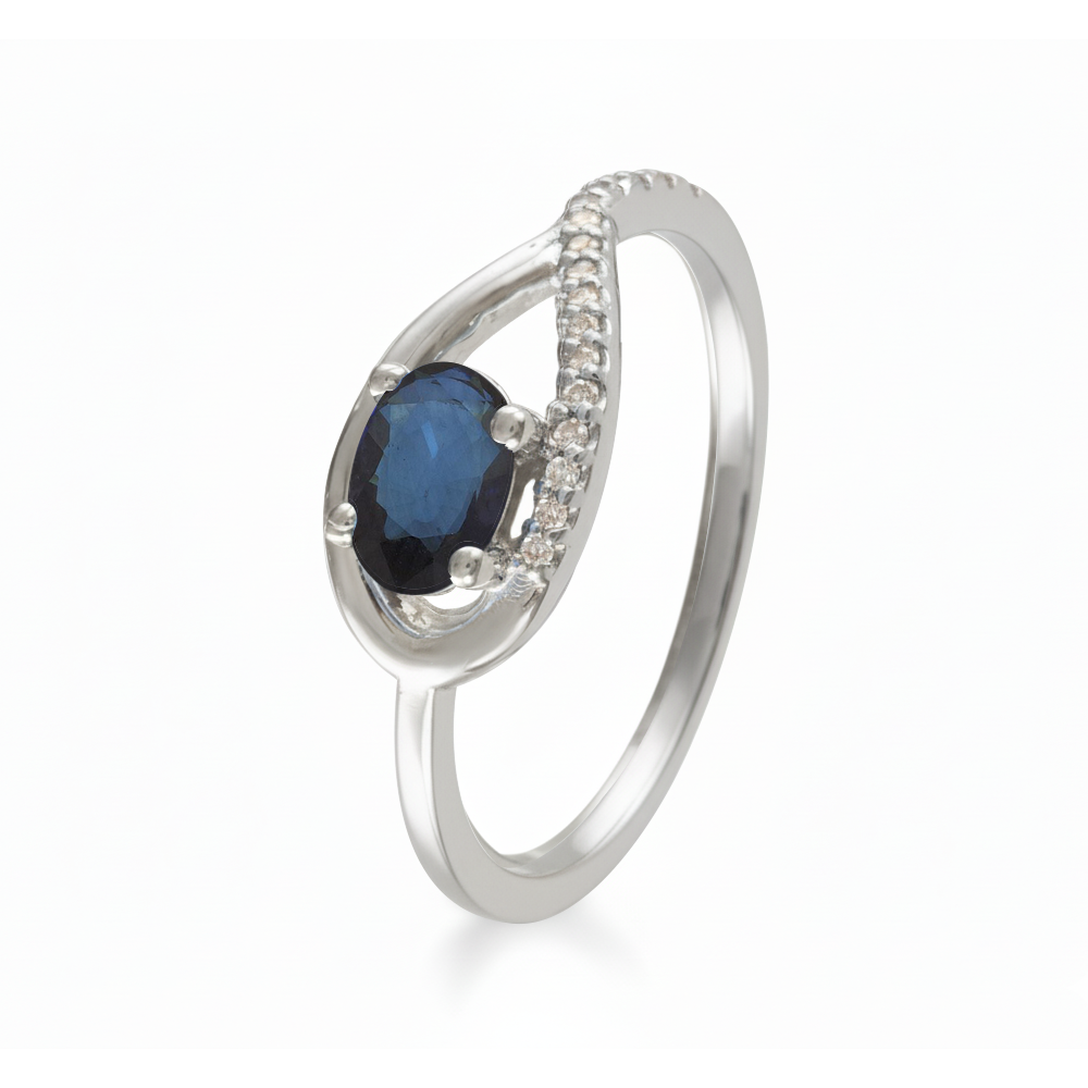 Juego de anillo y aretes con zafiro y diamantes