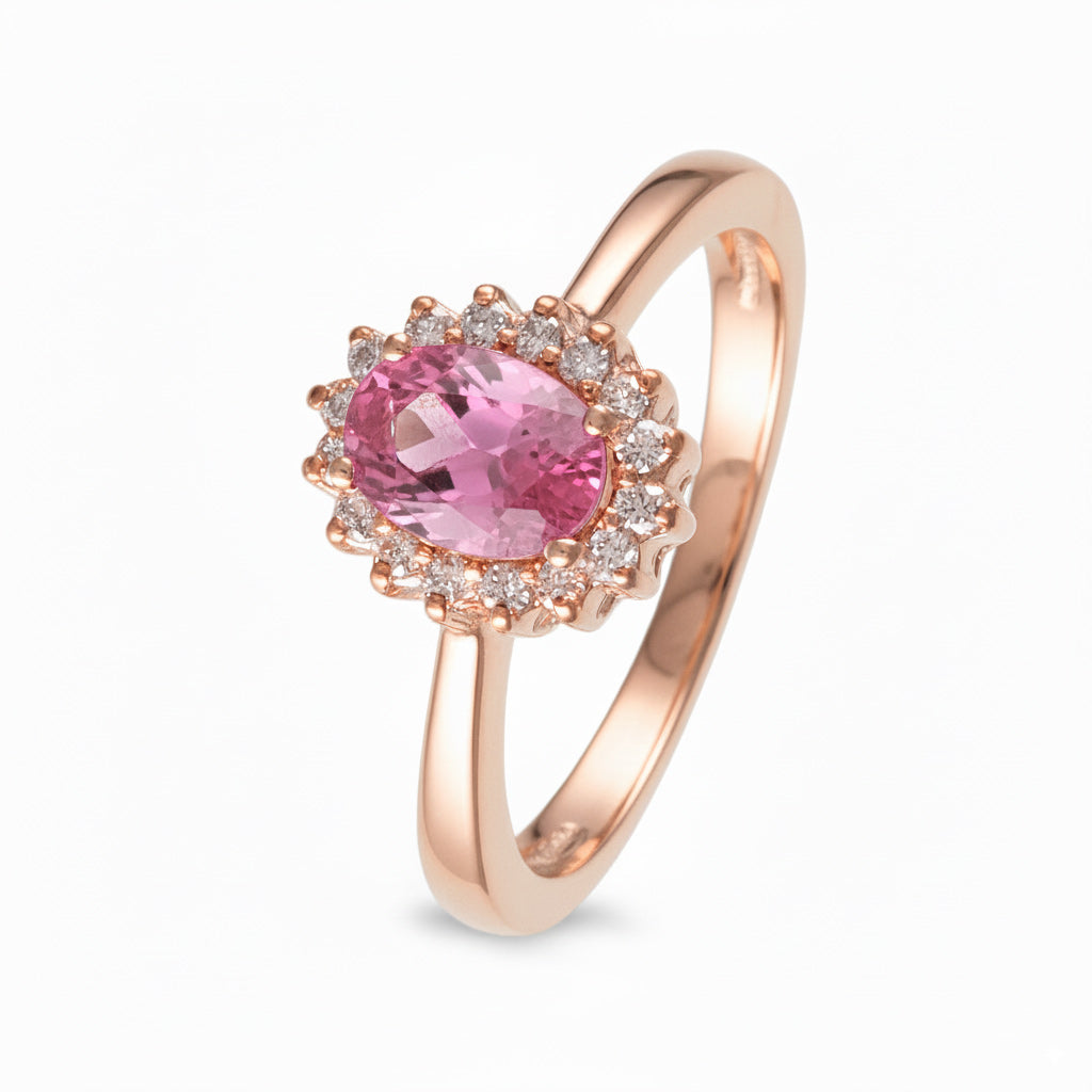 Anillo con zafiro rosa y halo de diamantes
