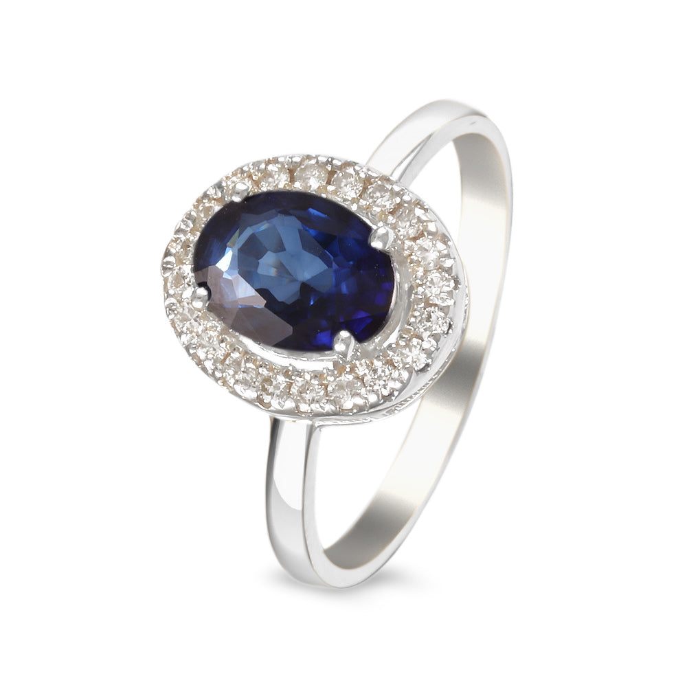 Anillo de oro blanco con zafiro y diamantes